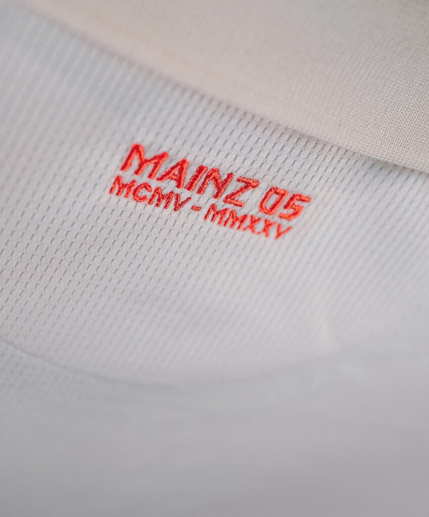 Mainz-05-lanca-oficialmente-sua-camisa-comemorativa-de-120-anos-com-design-classico-e-sofisticado-16-e1742041726883-849x1024 Jako lança camisa de 120 anos do Mainz 05 para 2025